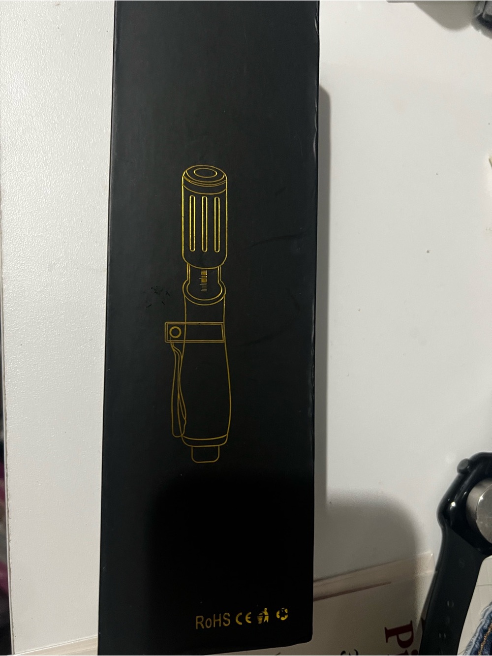 Black Holster Clip with Gold Accent Detailing
